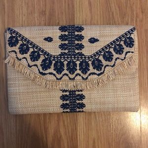 Stella and dot clutch.
